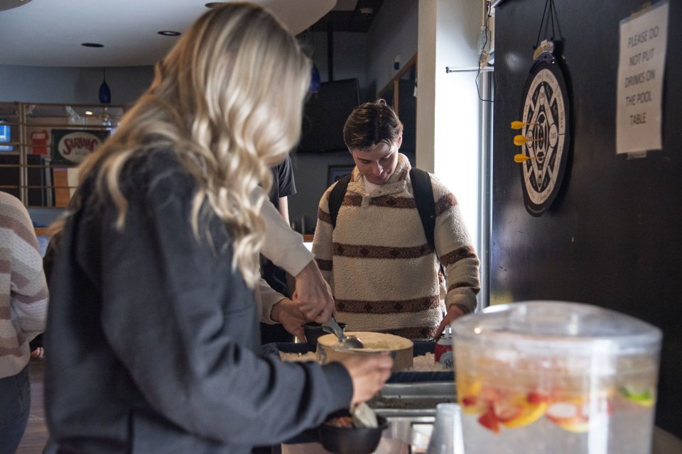 Students make their own sundaes in Pioneer Cafe.